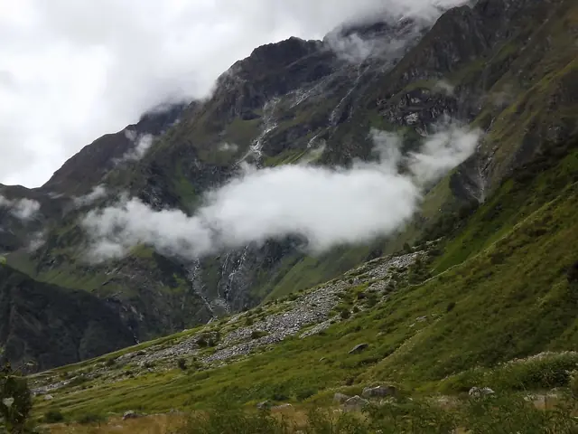 A cloud bank resting halfway up the valley wall