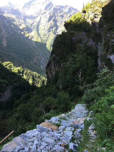 The trail cut into the cliff above the gorge